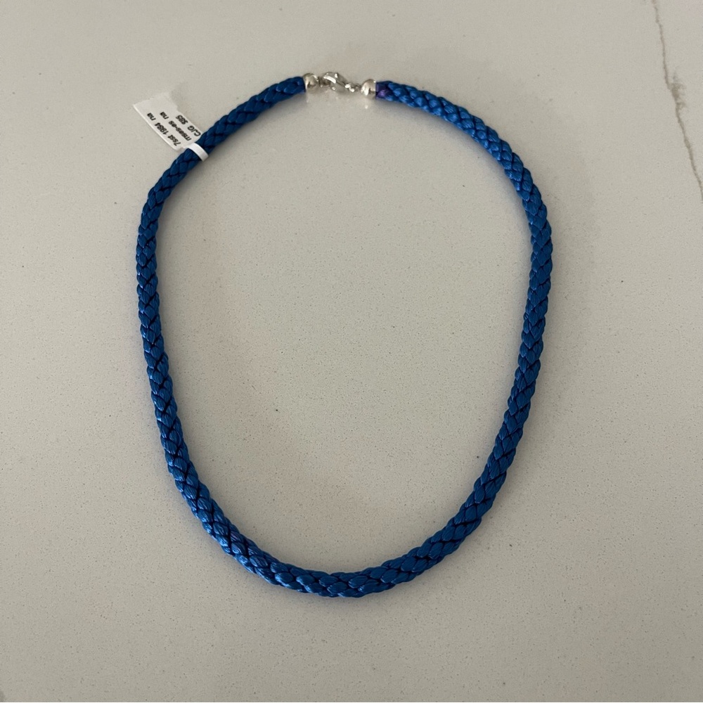Blue Silk Braided 16”Necklace with Sterling silver caps and clasp.